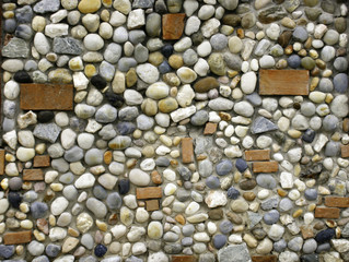background made of a wall with pebbles