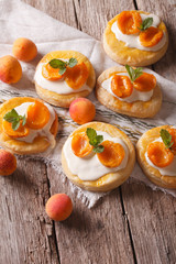 Homemade apricot cookies with a delicate cream vertical
