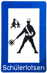 A traffic sign in Germany: School crossing guards