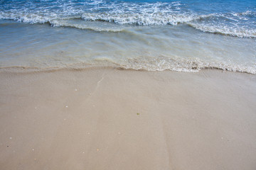 Soft wave of the sea on the sandy beach