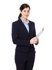 Confident Businesswoman hold with clipboard