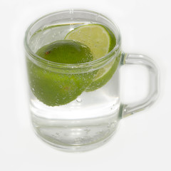 lime and mint  in the water with bubbles