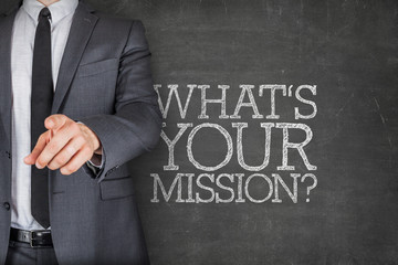 Fototapeta na wymiar Whats your mission on blackboard with businessman