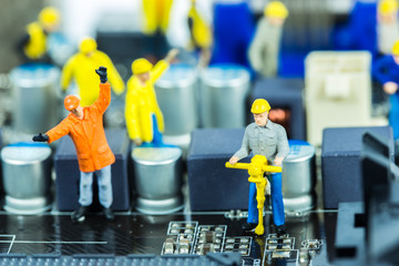 Team of engineers repairing circuit mother board. Computer repai
