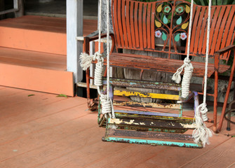 rusty iron seat swing