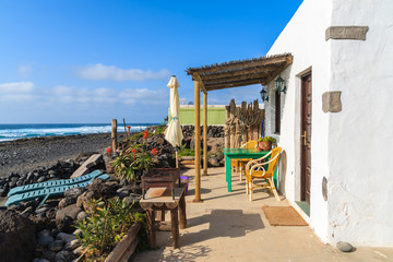 Typical Canarian house for tourists on El Golfo beach, Lanzarote, Canary Islands, Spain
