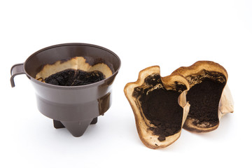 Black coffee and coffee filters, coffee with white background.