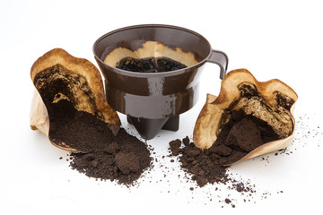 Black coffee and coffee filters, coffee with white background.