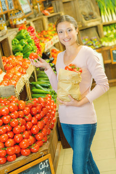 Woman doing her weekly vegetable shop