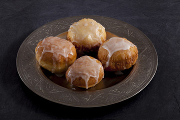 Fresh baked German Jelly Doughnut filled with jam and dusted with sugar icing