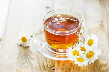 Cup of tea with chamomile