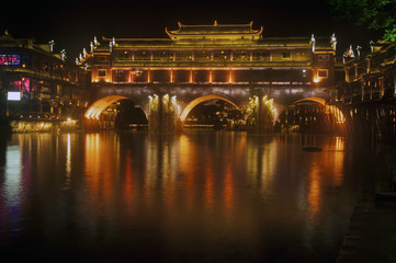 Fototapeta na wymiar Night scene at Fenghuang ancient city.