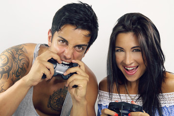 young couple playing video games © rdrgraphe