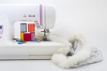 Background with sewing tools and colored fabric