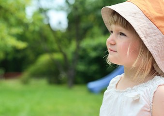 Cute little girl. Outdoors scenery.
