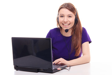 Pretty girl works at the computer