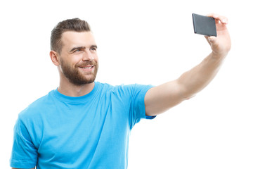 Man with beard doing selfie 