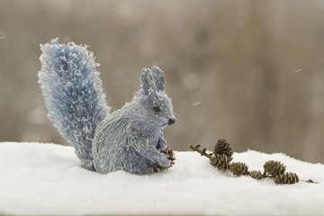 Squirrel with a silver Christmas decorations
