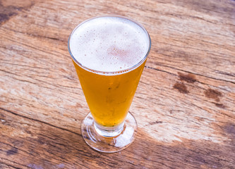 Closeup beer grass on wood background