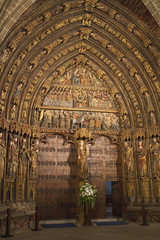 Wood carved polychrome portal from the 14th century in the Church of Santa Maria de los Reyes(Saint Mary of the Kings).Laguardia,Spain