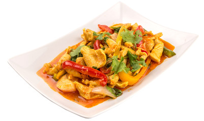 Malaysian traditional dish of Ayam Paprik or spicy stir fry chicken on white plate over white background