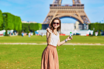 Young woman in Paris on a summer day