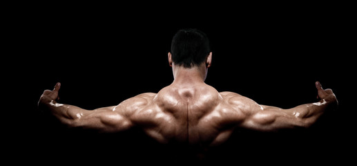 Fototapeta na wymiar Rear view of healthy muscular young man