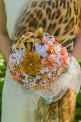 Handmade ribbon wedding bouquete.