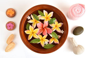 Flowers spa tub, Frangipani flowers spa tub on white background.