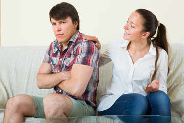 Woman consoling the depressed man