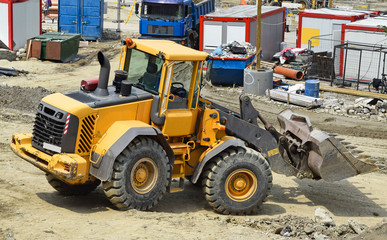 Fototapeta na wymiar Excavator at the construction site