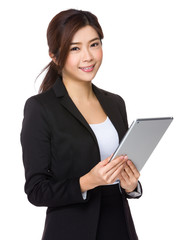 Asian Young businesswoman use of the tablet pc