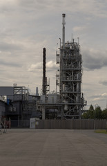 A factory and a lot of pipes and chimneys