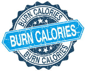 Obraz premium burn calories blue round grunge stamp on white