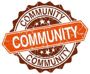 community orange round grunge stamp on white