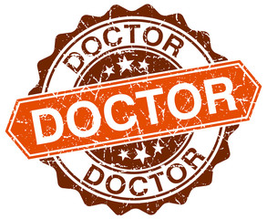 doctor orange round grunge stamp on white