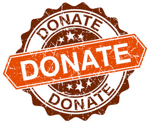 donate orange round grunge stamp on white