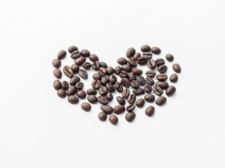 Heart from coffee beans isolated on white background.