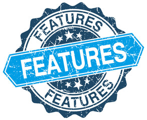 Fototapeta premium features blue round grunge stamp on white