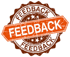 feedback orange round grunge stamp on white