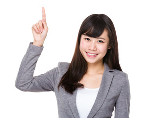 Asian businesswoman with finger point up