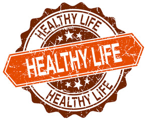 healthy life orange round grunge stamp on white