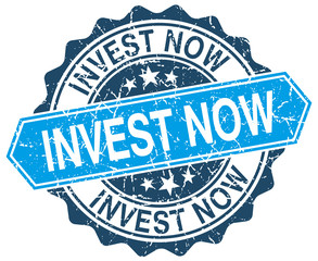 invest now blue round grunge stamp on white