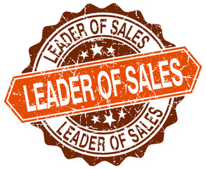 leader of sales orange round grunge stamp on white