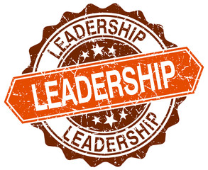 leadership orange round grunge stamp on white
