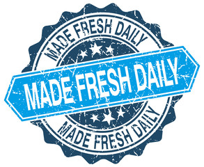 made fresh daily blue round grunge stamp on white