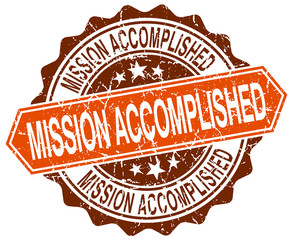 mission accomplished orange round grunge stamp on white