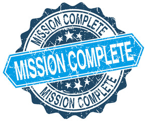 mission complete blue round grunge stamp on white