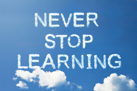 "never stop learning " a cloud word on sky