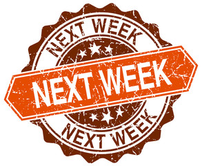 next week orange round grunge stamp on white
